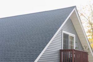 Home with grey asphalt roof shingles 